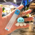 Cute light blue octopus keychain with BLOSSOM FOR YOU strap and gold lobster clasp - Glowing Octopus-Blue Grey