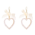 Detail of sweet bow earrings featuring faux pearls in a golden heart-shaped frame - White (Gold Hook)