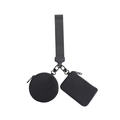 Detail of black tactical wrist pouch featuring a round coin purse and rectangular pocket - Black