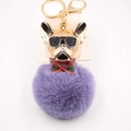Dettaglio portachiavi bulldog francese con pompon viola e ciondolo dorato - Violetto