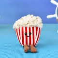 Detailed macro view of the cute popcorn plush pendant with red stripes and corduroy legs - Popcorn (Bead Chain) / 12cm