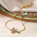 18K gold plated cross bracelet with black and white zircon pavé and adjustable slide clasp - Black & White Zirconia Cross