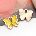 Goldene Schmetterlingsanhänger für DIY-Schmuck in Gelb und gestreifter Metalloptik - Gelber Schmetterling (12x11 mm)
