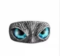 Retro silver owl ring with detailed feather texture and striking blue gemstone eyes - Vintage