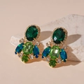 Macro detail of vintage gold earrings with emerald green and navy blue crystals - Green Geometric Drop Earrings (Silver Needle)