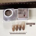 Mocha brown nail gel polish #01 showing gradient effects on four tips with open jar - Autumn Limited Edition Slap Gel No. 1