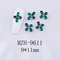 Macro view of 9x11mm emerald green butterfly nail art charms with silver alloy base - Emerald Green Gem - Silver Base (MZH-9611)