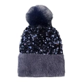 Close-up of navy sequined knit hat with grey plush cuff and fluffy top pom-pom detail - Navy Blue