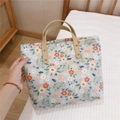 Detail of floral canvas tote bag with rivets and light beige handles on white linen - Light Grey Base Orange-Pink Small Flowers
