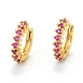 Close-up of 18K gold plated huggie earrings featuring row of pink cubic zirconia stones - Red