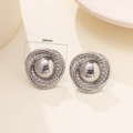 Detailed view of silver stainless steel textured hoop earrings with a 24mm diameter size - Silver Style (SQ-245215S)