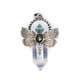 Macro shot of natural fluorite crystal pillar necklace with vintage metal dragonfly detail - Colorful Fluorite