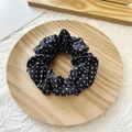 Elegant black hair scrunchie with white polka dots pattern on wooden tray for women - Black with White Polka Dots