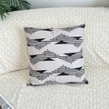 Detail of grey cotton linen pillowcase with black geometric patterns on a white sofa - Light Grey Geometric (Insert Not Included)