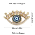 Golden copper evil eye pendant featuring clear crystals and blue eye motif with dimensions - YSN031-10 (Yellow Blue White Eye)