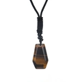 Detail of tiger eye stone pendant with natural cat eye effect on black woven cord - Tiger Eye