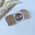 Brown pleated cotton viscose shawl in a minimalist roll with floral fashion paper sleeve - Style #19