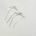 Elegant silver-tone bow earrings with long chain tassels and 14K gold plating finish - Long Style / Silver