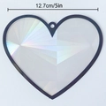Detail view of 5-inch heart suncatcher with holographic pattern and black frame - TYSC003: Optical Rainbow Prism Heart