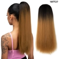 Drawstring ponytail extension in dark brown to blonde ombre shade 1BTT27 on model - Ombre Black to Dark Blonde (1BTT27)