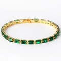 Elegant gold finish bracelet with rectangular emerald green stones in a classic setting - Gold Green Zircon