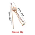 Wooden cat teaser toy with plush lion charm, colorful tassels and rustic wood handle - Plush Lion Cat Teaser
