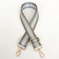 Close-up of adjustable grey and silver striped nylon strap with gold lobster clasps - Medium Grey + Gold Hook