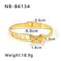 Detail of 18K gold-plated bow bracelet with dimensions 6.0cm diameter and 18.9g weight - Style NB-B6134