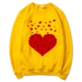 Bright yellow crewneck sweatshirt featuring a large red heart print made of small hearts - Yellow Slogan