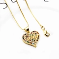 Detailed macro of gold heart pendant with colorful zircon stones and LOVE engraving - LOVE Letter Heart-Gold (with Necklace)