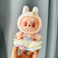 Pink plush rabbit costume and skirt set for Labubu vinyl art toy dolls - Blue Ribbon Skirt With Colorful Pom-poms / First And Second Generation Keychains Are Compatible With La Cloth Dolls. Dolls Not Included.