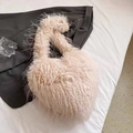 Chic light pink plush crossbody bag featuring fluffy faux fur for winter fashion - Light Coffee