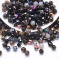 Macro shot of 32-facet multifaceted crystal glass soccer beads with AB coating finish - 3MM Approx 200pcs/Bag / Black Series