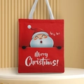 Detail of red Christmas canvas tote bag featuring Santa Claus print and Merry Christmas text - Style 30