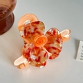 Elegant acetate flower hair claw clip in orange and tortoiseshell pattern finish - 8cm / Orange
