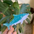 Detailed view of shark-shaped hair claw clip with blue and white marble acetate texture - Aqua Blue Shark White Eye