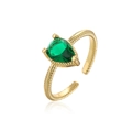Macro detail of pear-shaped emerald zircon on gold-plated twisted rope adjustable ring - Adjustable Open / Green Zirconia