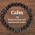 Matte black onyx and lava stone beaded stretch bracelet with metal spacers - Calm