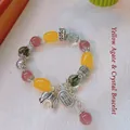 Ethnic beaded bracelet with yellow agate, green phantom crystal, and elephant charm - Yellow Barrel Bead Agate Lucky Elephant Bracelet