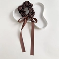 Elegant coffee brown satin scrunchie with a long bow ribbon on a white ceramic tray - Dark Coffee