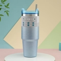 Close-up of 30oz light blue glitter vacuum insulated stainless steel tumbler with straw - 30oz/890ml / Gradient Blue
