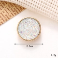 Macro detail of 2.5cm gold frame button with iridescent glitter for DIY shoe charms - C135 Glitter Round