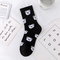 Mid-calf cotton sock in black featuring white cartoon bear patterns on paper background - Black White Bear (No.03 All-over Bear Print)