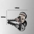 Silver stainless steel key earring stud with dimensions of 1.59cm by 0.67cm - Key Style (S305)