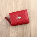 Women's red PU leather wallet with V-quilted stitching and gold bee metal buckle accent - Red