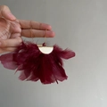 Vintage style burgundy feather tassel earrings with golden metal semi-circle accents - Red