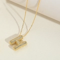 Gold H initial pendant necklace with cubic zirconia pavé on a thin cross chain - H(XL3533-1)