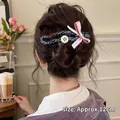 Franse haarspeld in marineblauw met vintage knopen en een roze satijnen strik - 9# Blauwe Beer Roze Eend Clip 11cm