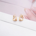 Detail of S925 sterling silver gold ear clips with soft silicone pads and S925 hallmark - One Pair / Gold