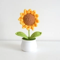 Handmade crochet sunflower potted plant with yellow petals in a white ceramic pot - Sunflower